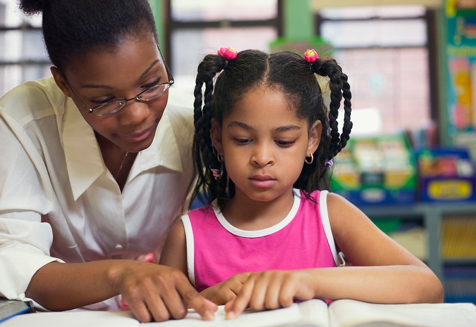 Teacher and young student