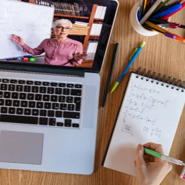 Virtual learning workspace with laptop and notebook